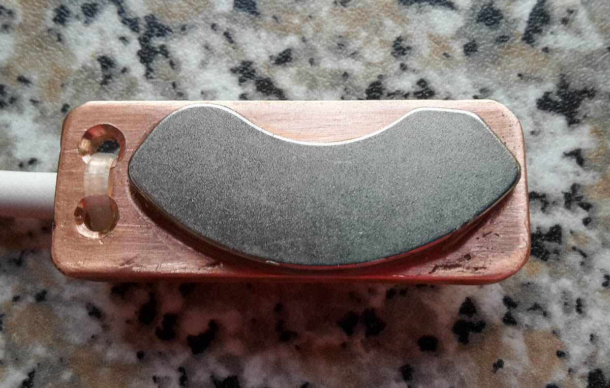 iSocket Temperature Sensor Long is mounted on the copper block with magnet from HDD